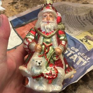 Festive Santa Claus Ornament with Polar Bear